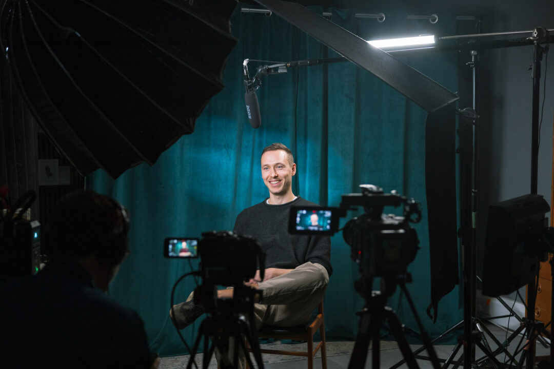 A man in a video production studio being filming for social content | Manto Films